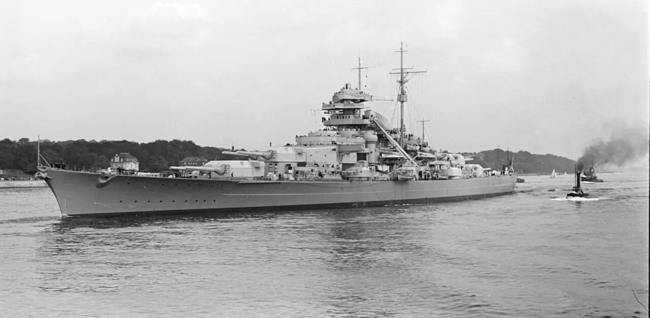 The German battleship Bismarck off Blankenese near Hamburg in 1940, with the tugboats Seefalke and Seebär at her stern.