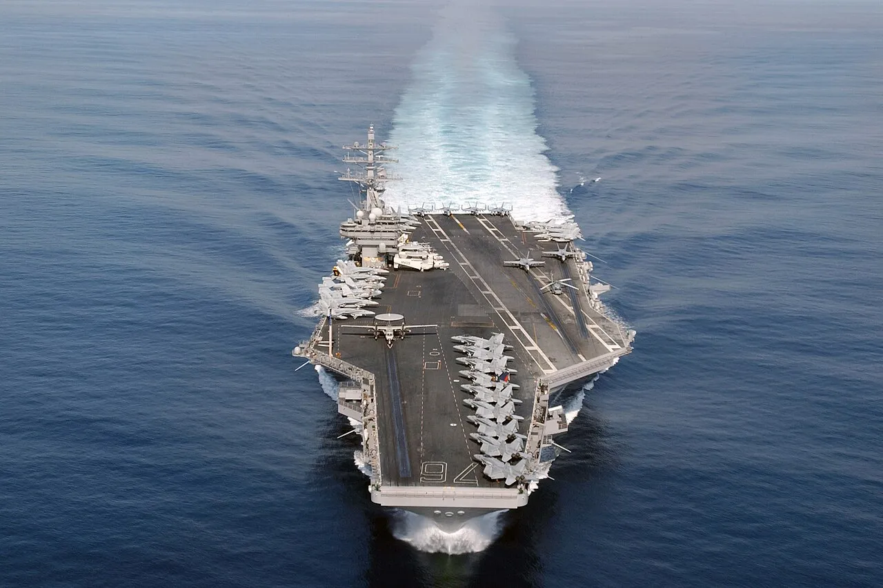 The Nimitz-class carrier USS Ronald Reagan (CVN-76) making a high-speed run in the Pacific Ocean during a 2005 training exercise.