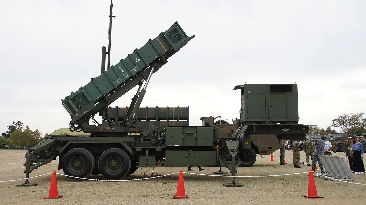 A Japan Air Self-Defense Force Patriot PAC-2 M901 launching station in launch mode, missile canisters raised, at Camp Nihonbara, Japan.