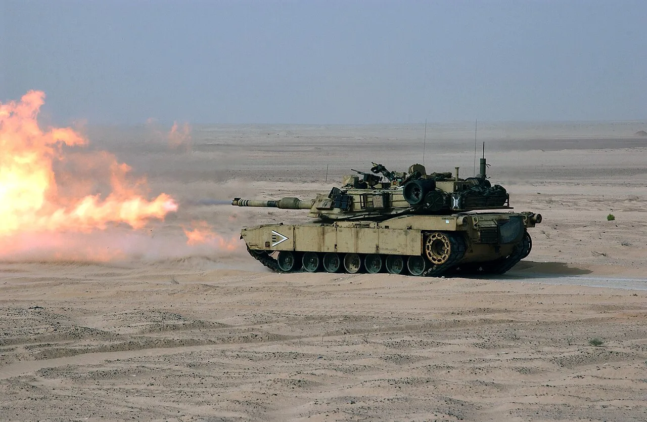 US Marines fire an M1A1 Abrams tank's main gun during a live-fire training exercise.