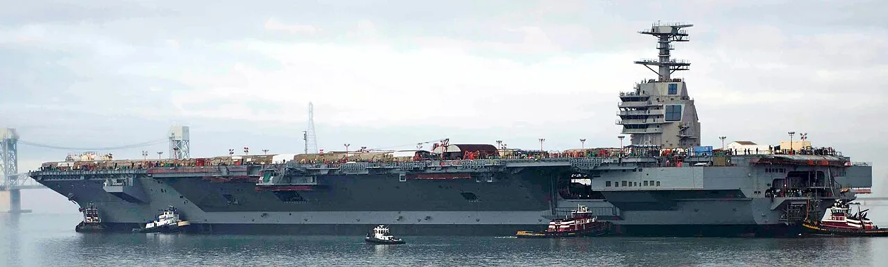 USS Gerald R. Ford, lead ship of the Ford-class aircraft carriers, under way on the James River in 2013 during construction.