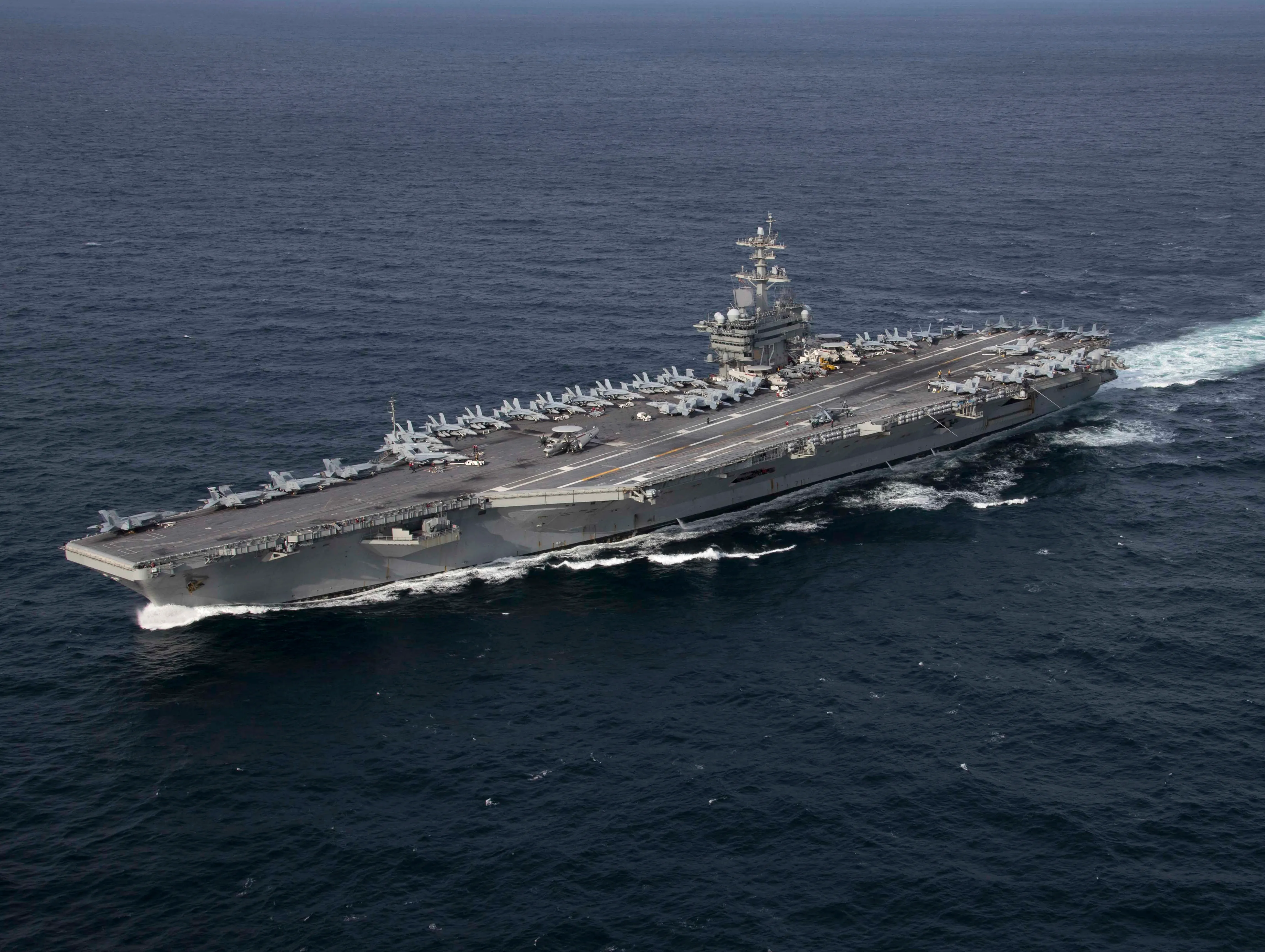 USS Abraham Lincoln underway in the Atlantic Ocean during a strait transit exercise.